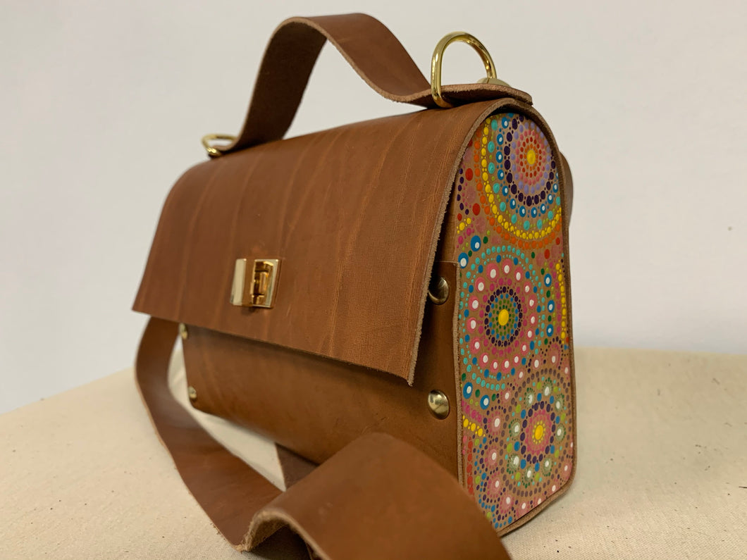 leather bag with wooden accessories in brown